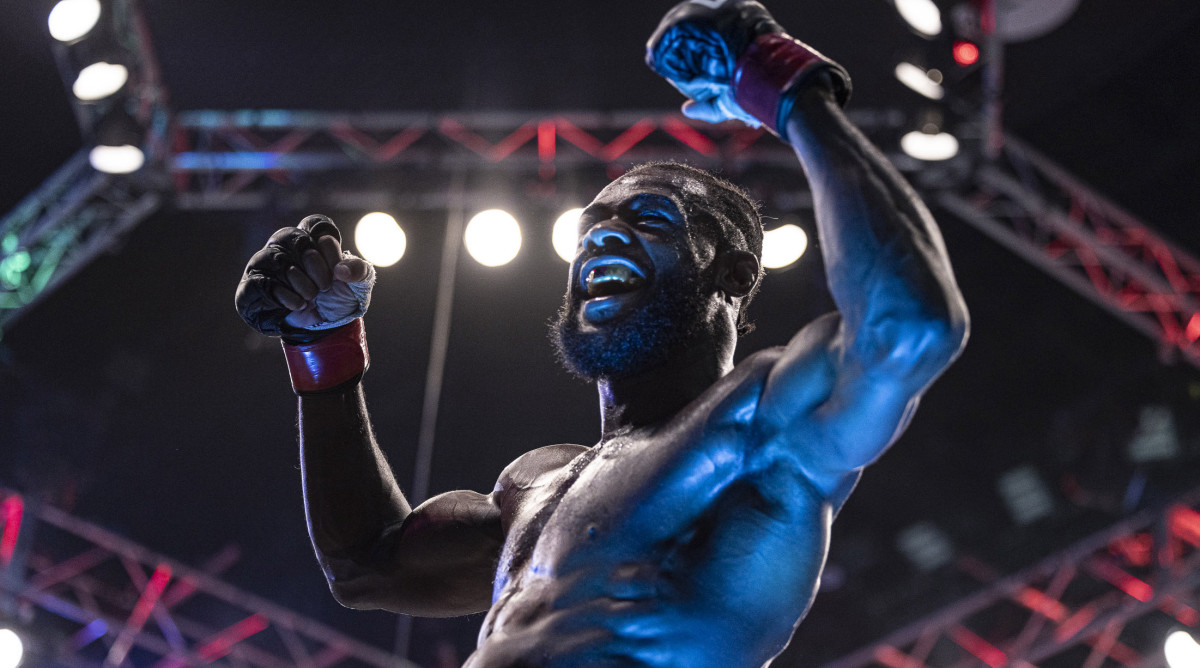 Aljamain Sterling celebrates after defeating T.J. Dillashaw during UFC 280
