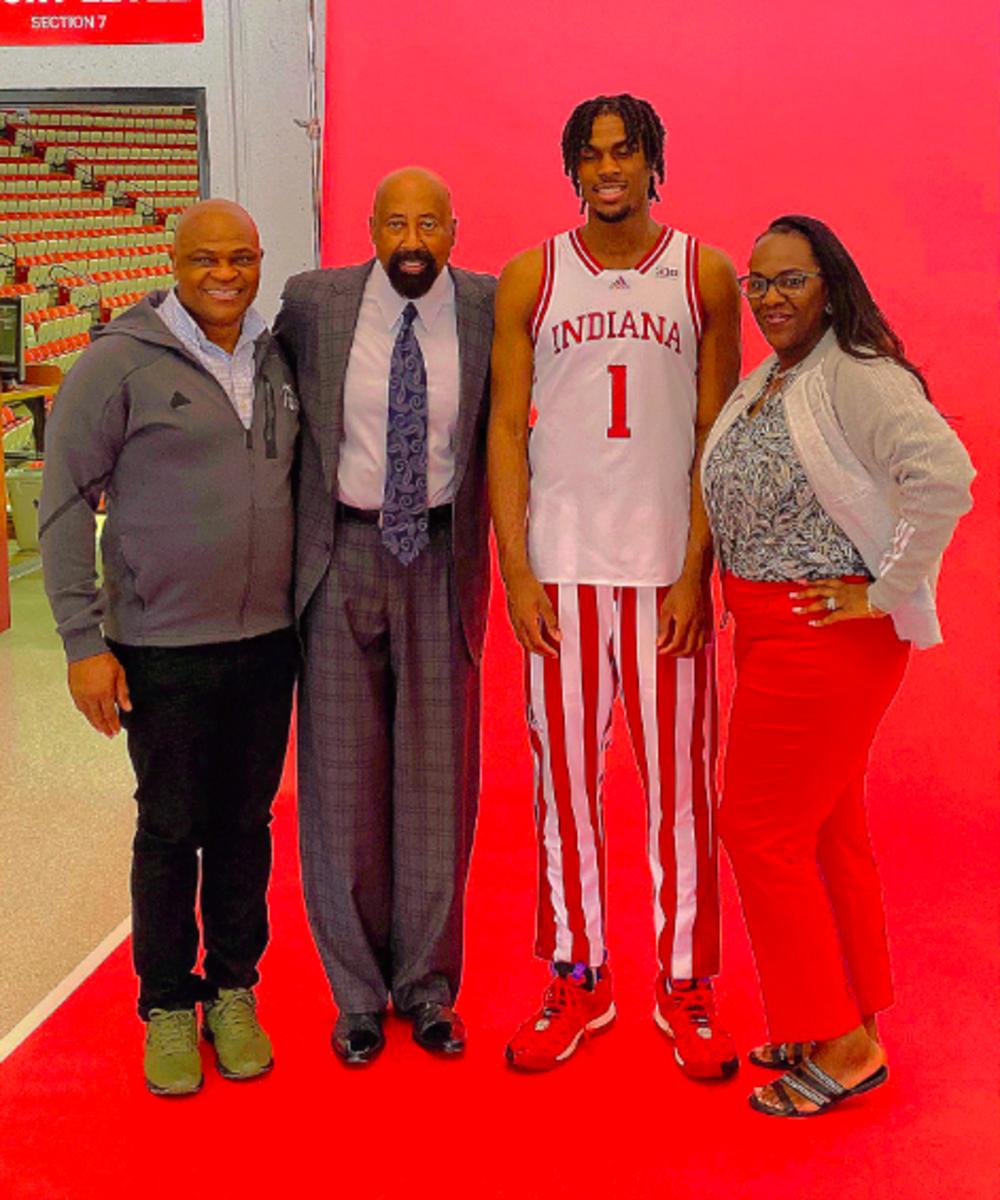 Mackenzie Mgbako wears the iconic candy stripe alongside his parents and Indiana coach Mike Woodson.