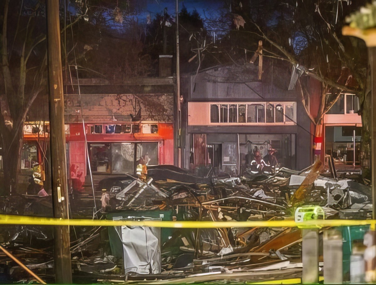 A view of the damage from a natural gas leak that sparked an explosion outside Tim Pipes’s bar.