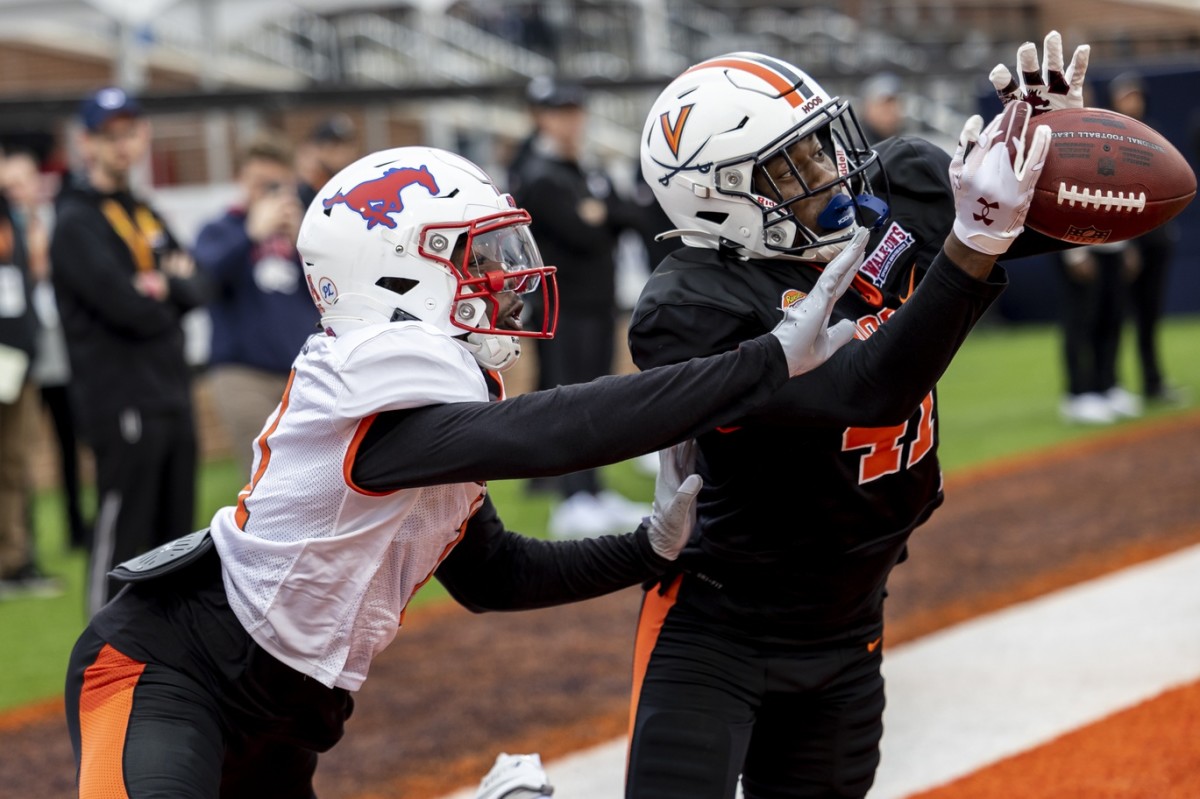 Feb 2, 2023; Defensive back Anthony Johnson Jr. of Virginia (41) breaks up a pass for wide receiver Rashee Rice of SMU (11) during Senior Bowl practice. Mandatory Credit: Vasha Hunt-USA TODAY Sports