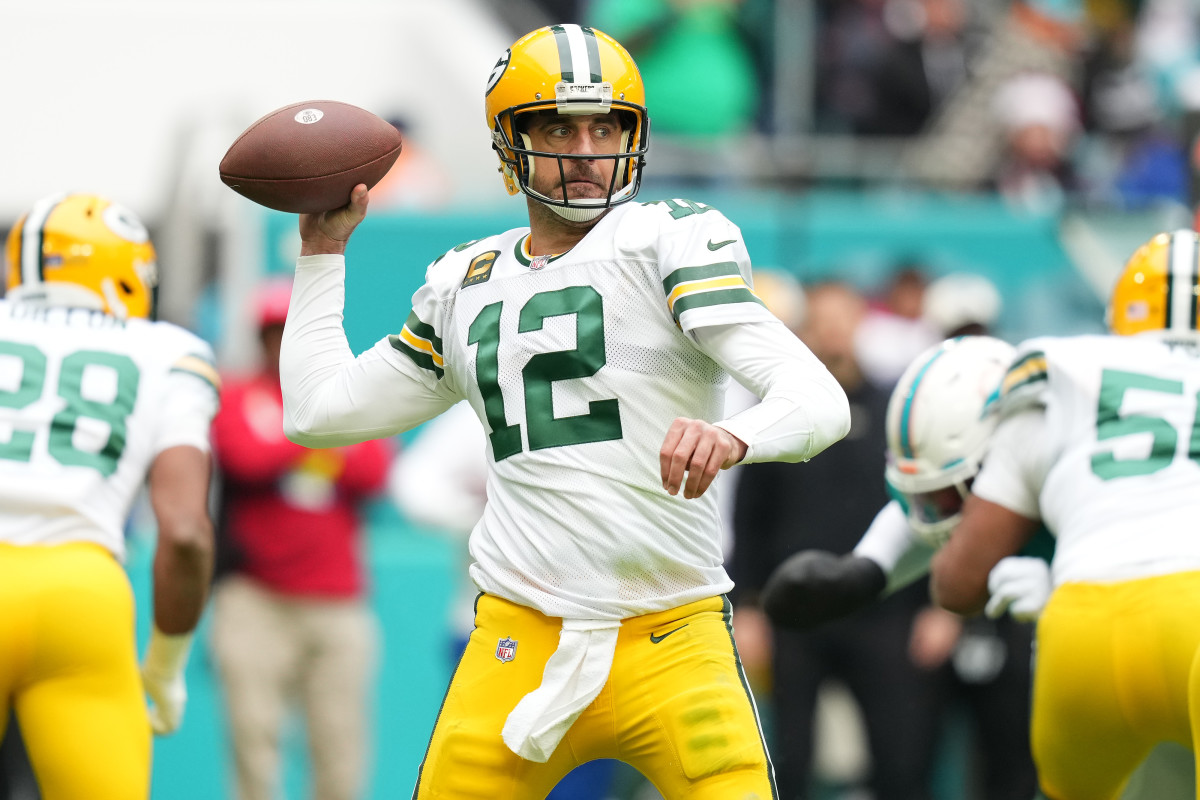Quarterback Aaron Rodgers attempts a pass against the Miami Dolphins in 2022