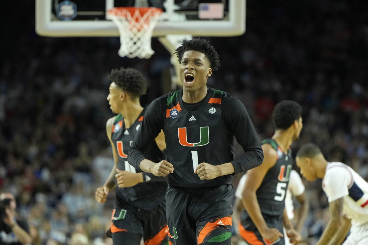 Hurricanes forward Anthony Walker (1) reacts after a play against the Connecticut Huskies during the first half in the semifinals of the Final Four of the 2023 NCAA Tournament at NRG Stadium.