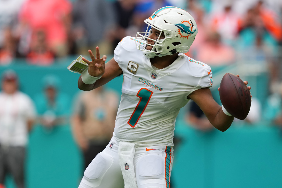 Dolphins' QB Tua Tagovailoa winds up to throw a pass against the Browns in a 2022 home game