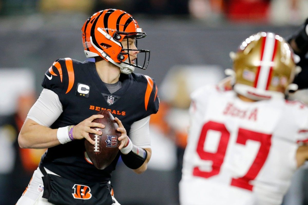Cincinnati Bengals quarterback Joe Burrow (9) drops back to throw in overtime of the NFL Week 14 game between the Cincinnati Bengals and the San Francisco 49ers at Paul Brown Stadium in downtown Cincinnati on Sunday, Dec. 12, 2021. The Bengals tied the game in the fourth quarter, but eventually fell to the 49ers in overtime, 26-23. San Francisco 49ers At Cincinnati Bengals