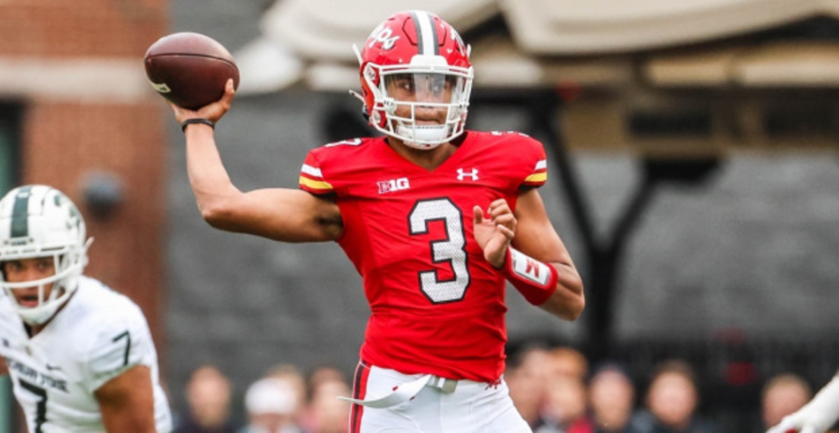 Maryland Terrapins quarterback Taulia Tagovailoa drops back for a pass in a college football game in the Big Ten.