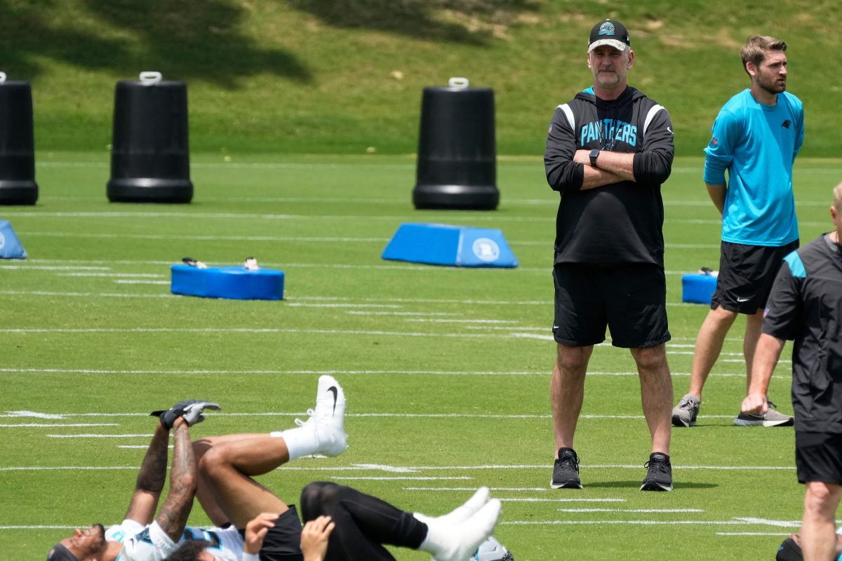 May 12, 2023; Charlotte, NC, USA; Carolina Panthers head coach Frank Reich looks on as rookies warm up during the Carolina Panthers rookie camp at the Atrium Practice Facility.