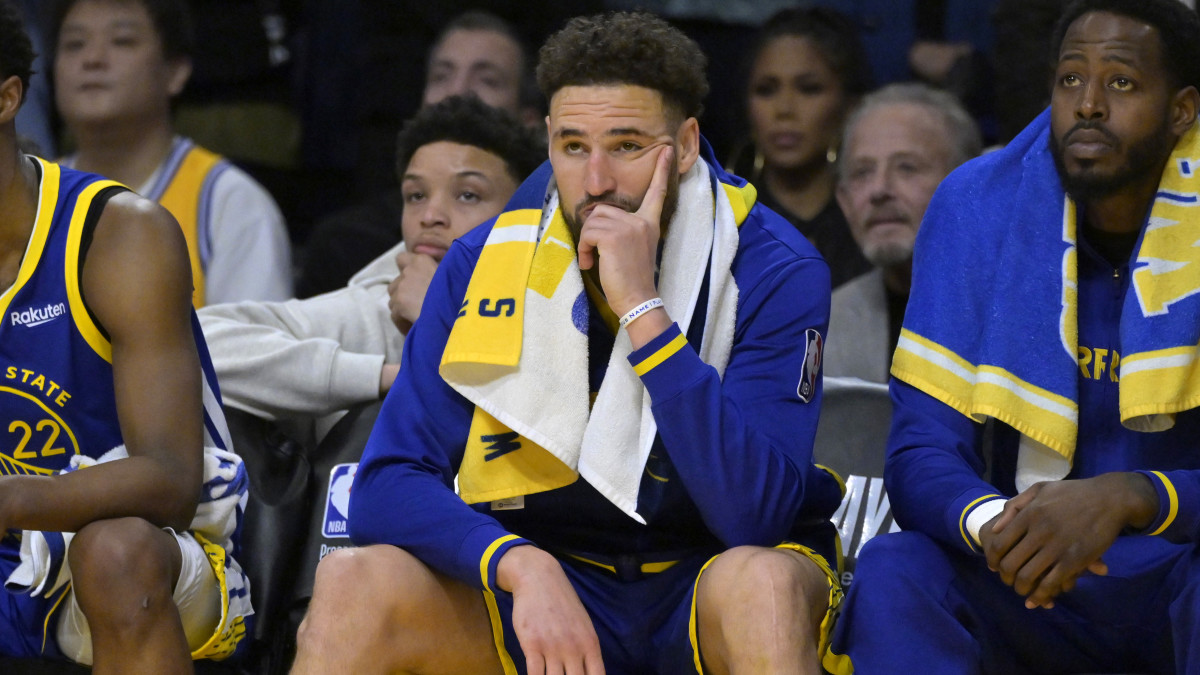 Golden State Warriors guard Klay Thompson looks on from the bench.