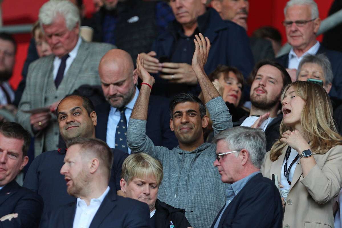 UK prime minister Rishi Sunak pictured clapping his hands before kickoff in Southampton's game against Fulham in May 2023
