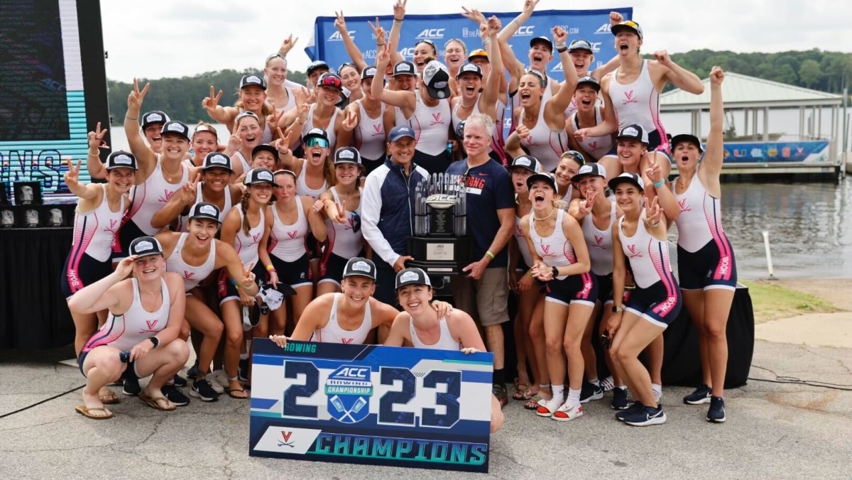 The Virginia rowing team celebrates after winning the 2023 ACC Rowing Championship on Lake Wheeler in Raleigh, North Carolina.