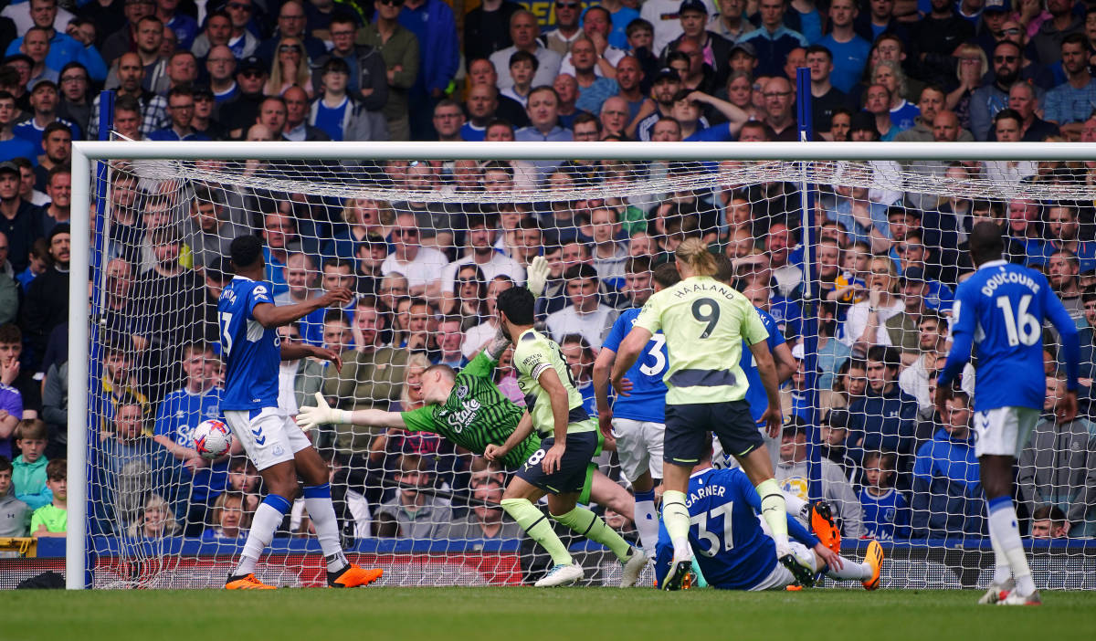 Ilkay Gundogan pictured (center) scoring for Manchester City against Everton in May 2023