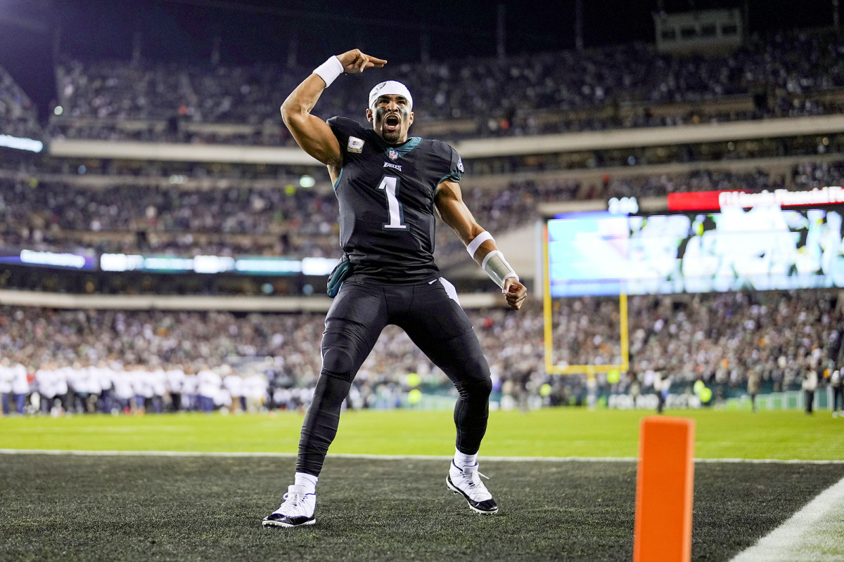 Jalen Hurts gestures to the crowd while standing in the end zone in Philadelphia