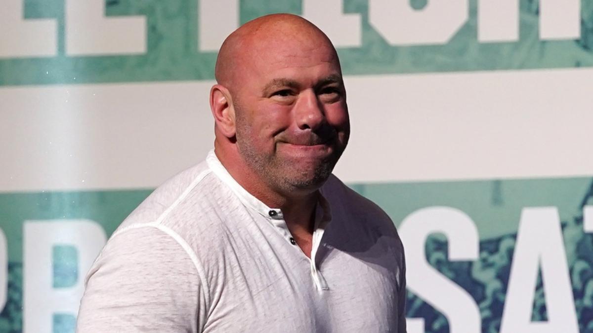 UFC CEO Dana White smiling during a press event.