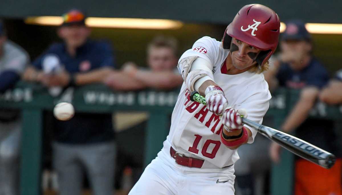 Alabama hitter Jim Jarvis (10) connects with a two-strike pitch against Auburn at Sewell-Thomas Stadium Friday, April 14, 2023 in Tuscaloosa.