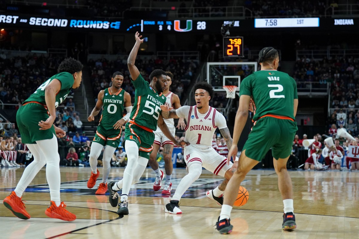 Mar 19, 2023; Albany, NY, USA; Indiana Hoosiers guard Jalen Hood-Schifino (1) drives to the basket against Miami (Fl) Hurricanes guard Wooga Poplar (55) during the first half at MVP Arena.