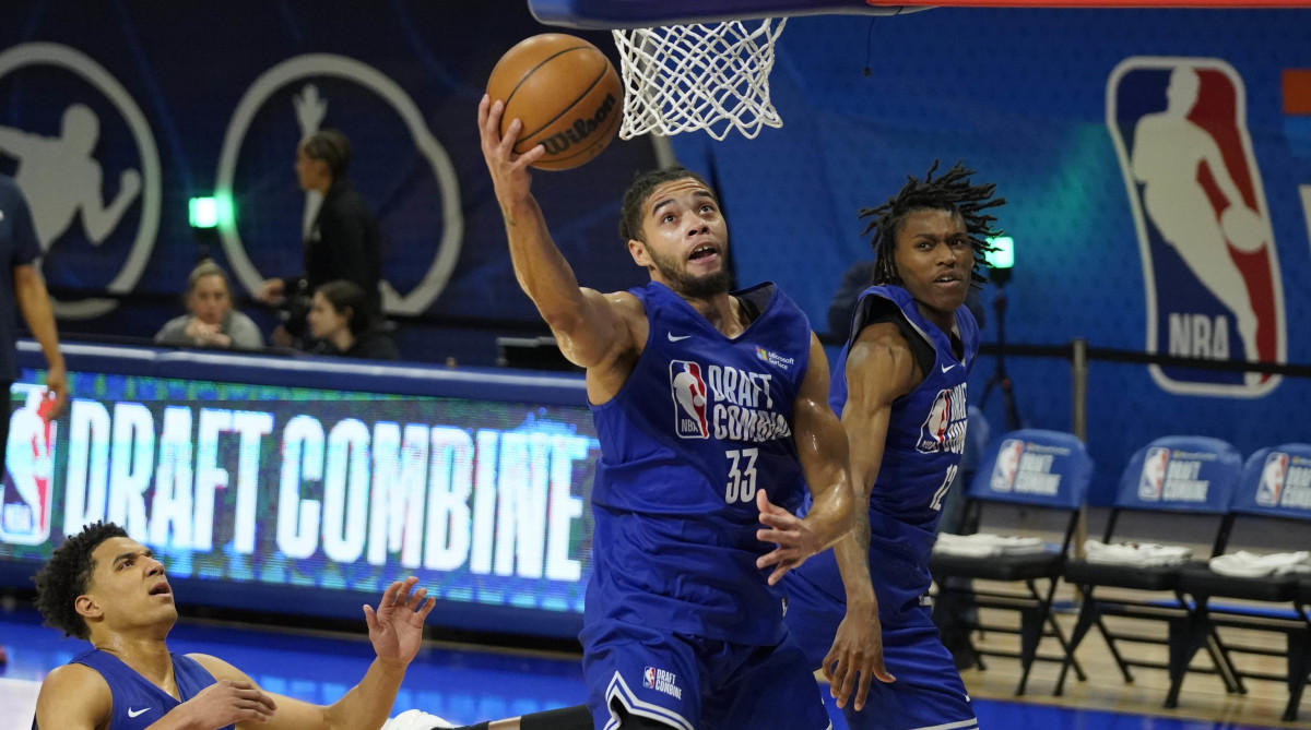 Penn State’s Seth Lundy goes in for a layup at the NBA combine.