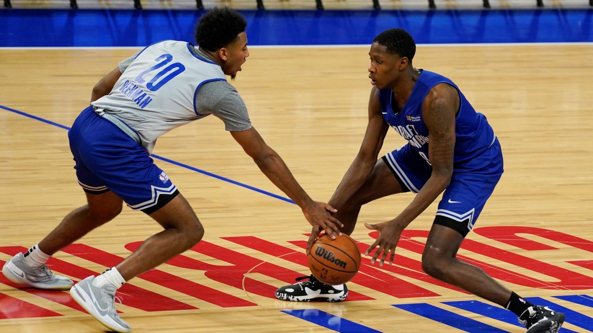 Reece Beekman (left) steals the ball from Omari Moore during the 2023 NBA Draft Combine at Wintrust Arena.