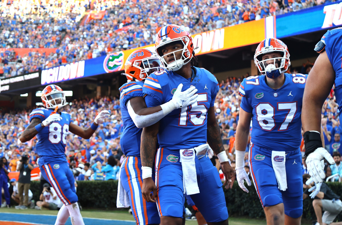 Nov 12, 2022; Gainesville, Florida, USA; Florida Gators quarterback Anthony Richardson (15) is congratulated after he scores a touchdown against the South Carolina Gamecocks during the first quarter at Ben Hill Griffin Stadium.