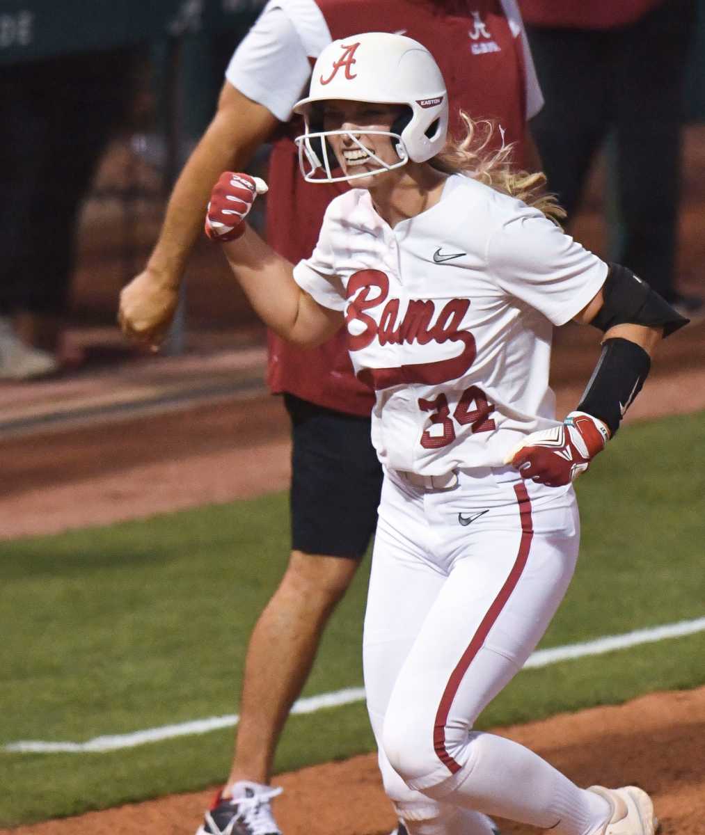 Alabama batter Ally Shipman (34) celebrates as she rounds third after hitting a two-run homer against Long Island University Friday, May 19, 2023, at Rhoads Stadium in the Tuscaloosa Regional of the NCAA Tournament.