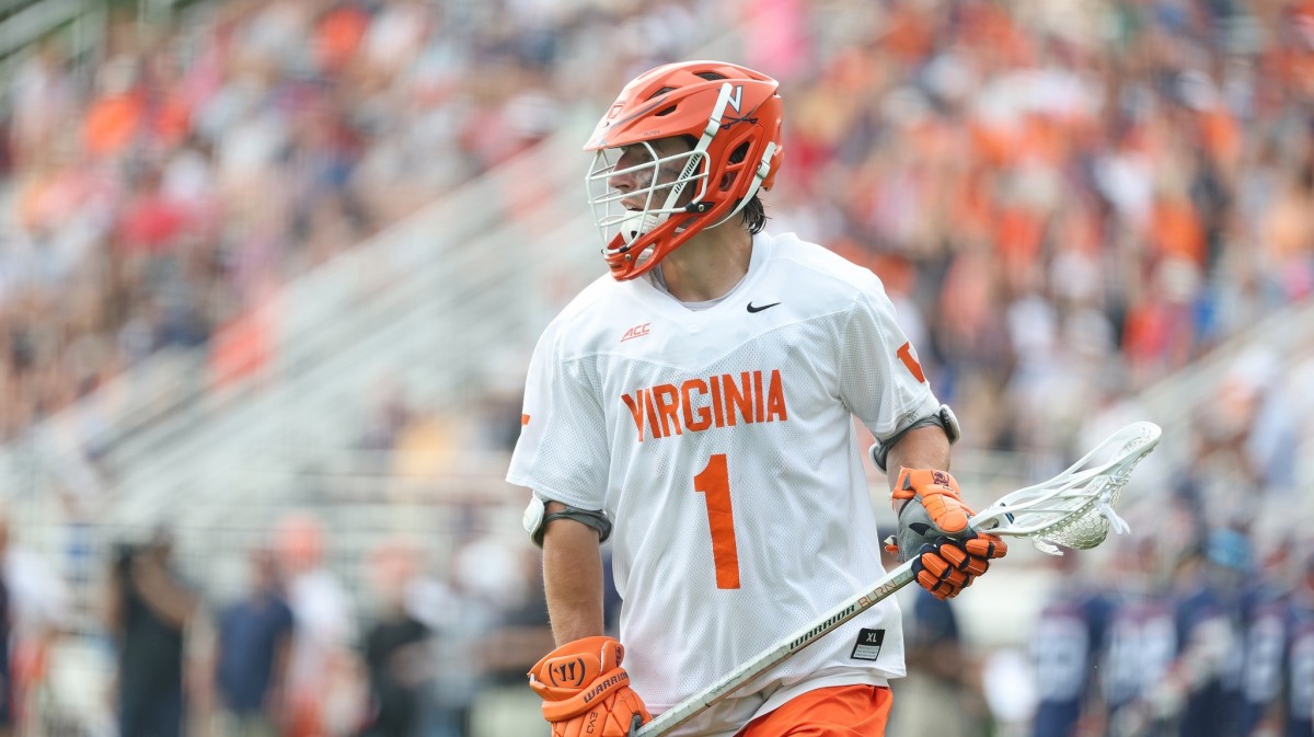 Connor Shellenberger cradles the ball during the Virginia men's lacrosse game against Richmond in the first round of the NCAA Men's Lacrosse Championship at Klockner Stadium.