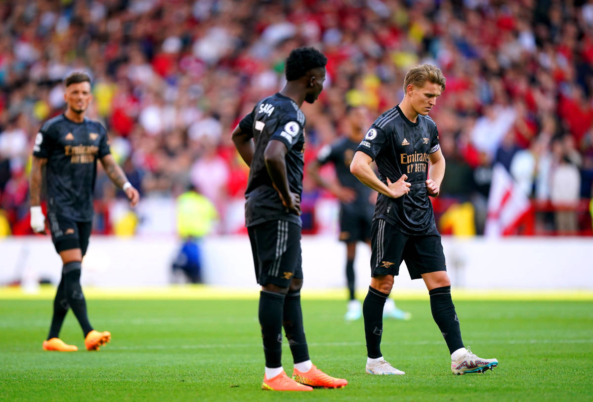 Players from Arsenal pictured looking dejected during a 1-0 defeat at Nottingham Forest - a result that ended their challenge for the Premier League title in May 2023