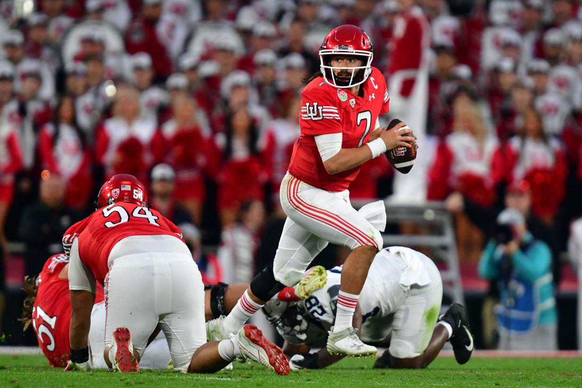 Jan 2, 2023; Pasadena, California, USA; Utah Utes quarterback Cameron Rising (7) runs against the Penn State Nittany Lions in the second half in the 109th Rose Bowl game at the Rose Bowl. Mandatory Credit: Gary A. Vasquez-USA TODAY Sports