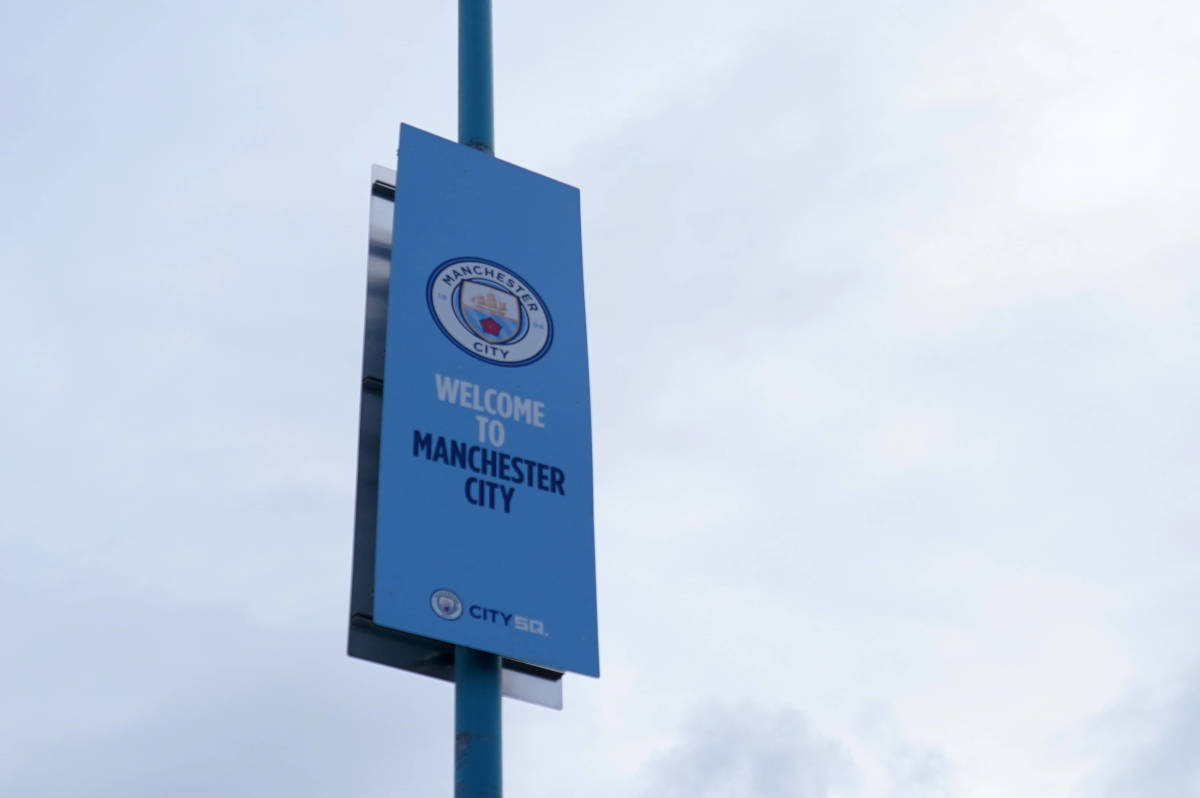 A sign pictured on a lamppost outside of the Etihad Stadium reading "Welcome to Manchester City"