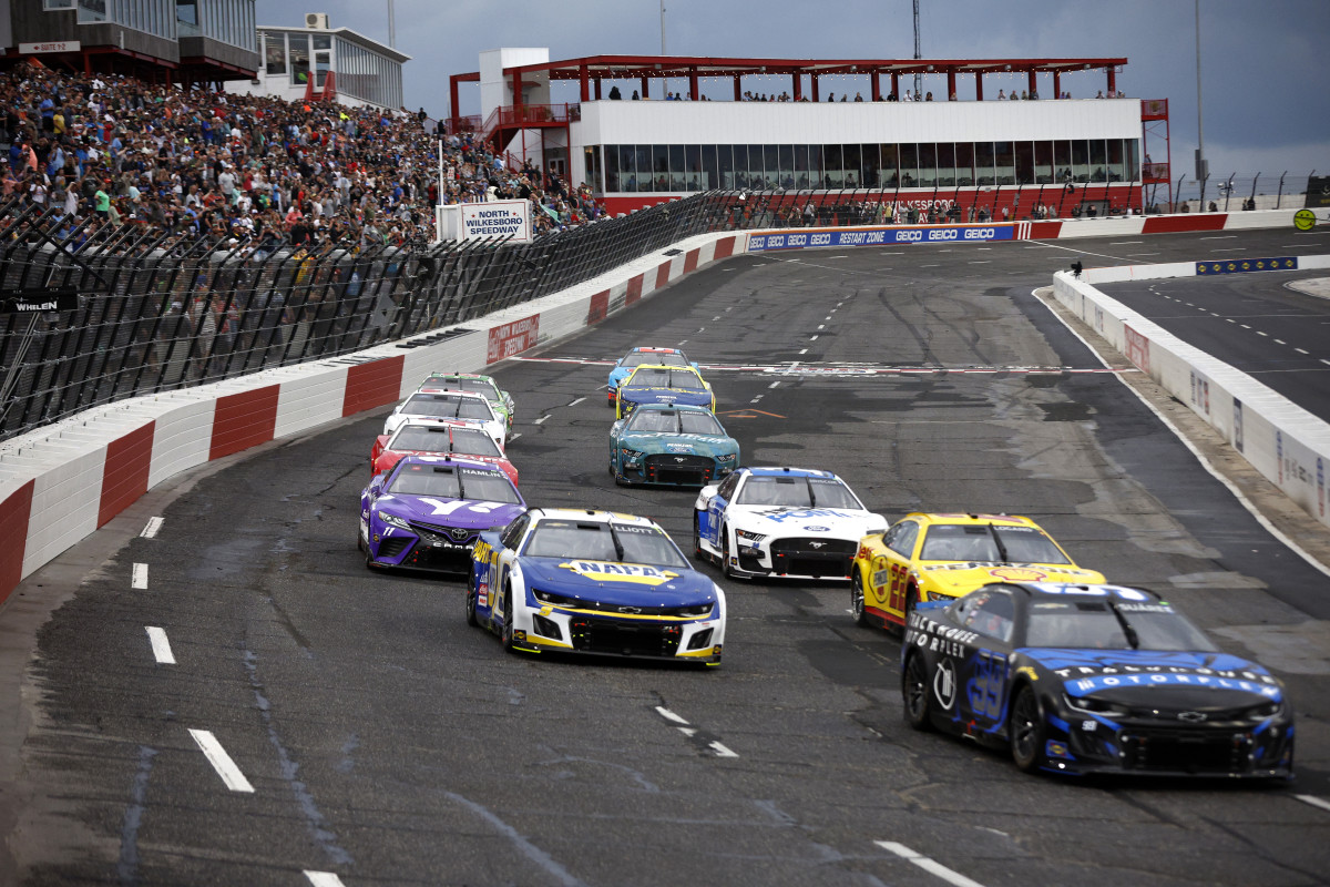 Daniel Suarez, Chase Elliott, Joey Logano and Denny Hamlin race during qualifying heat race #1 for the NASCAR Cup Series All-Star Race at North Wilkesboro Speedway. (Photo by Sean Gardner/Getty Images)