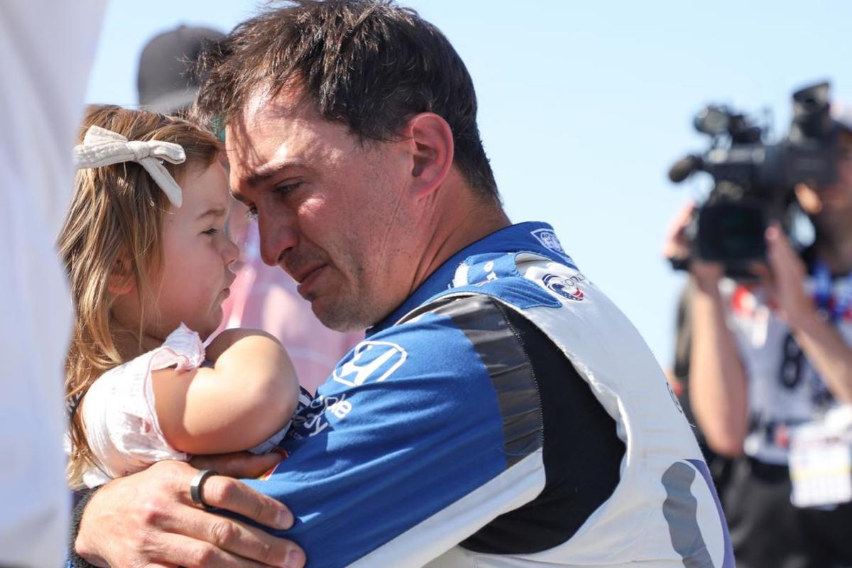 An emotional Graham Rahal hugs his daughter after he failed to qualify for next Sunday's 107th Running of the Indianapolis 500, the first time the younger Rahal has failed to qualify for the big race. Photo courtesy IndyCar.