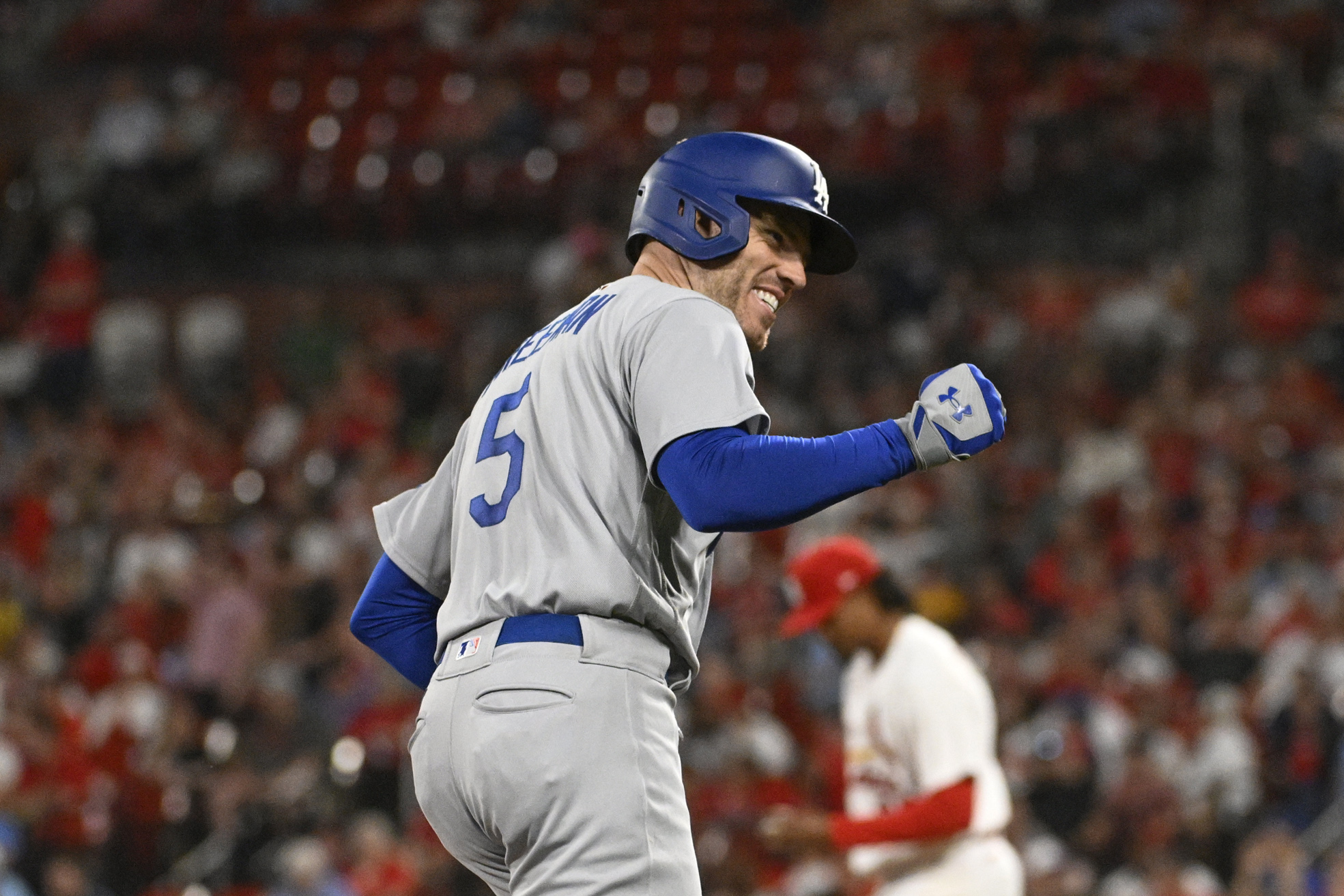 May 18, 2023; St. Louis, Missouri, USA; Los Angeles Dodgers first baseman Freddie Freeman (5) reacts after hitting a grand slam against the St. Louis Cardinals in the sixth inning at Busch Stadium. Mandatory Credit: Joe Puetz-USA TODAY Sports