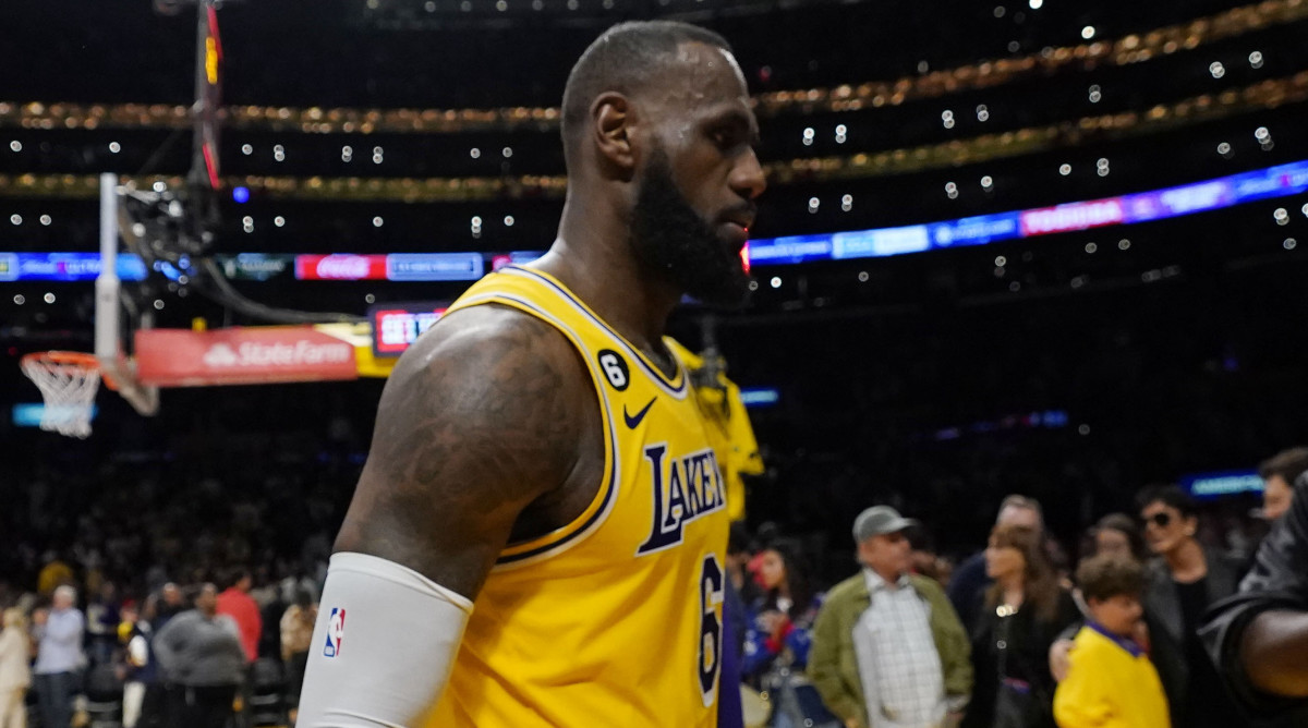 Lakers forward LeBron James walks off the court after Game 4 loss to Nuggets