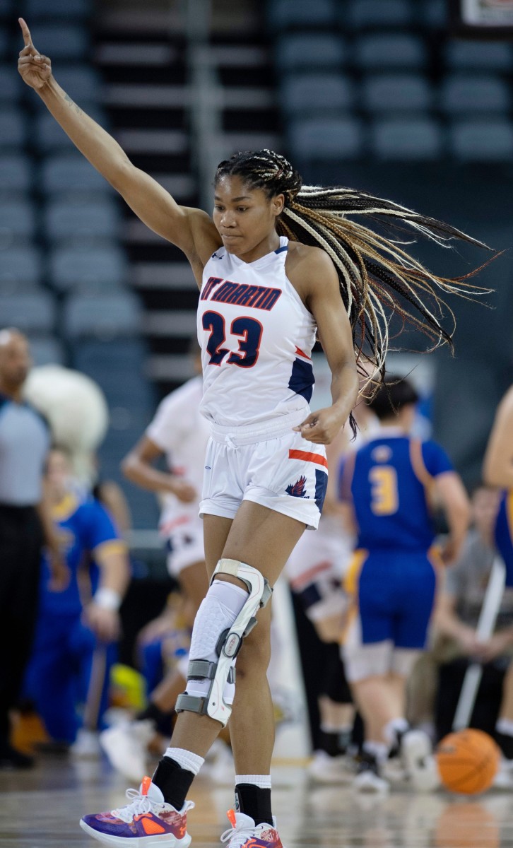 Tennessee Martin's Sharnecce Currie-Jelks (23) celebrates a three pointer against Morehead State during their first round game of the Ohio Valley Conference Women's Basketball Championship at Ford Center in Evansville, Ind., Wednesday afternoon, March 1, 2023.