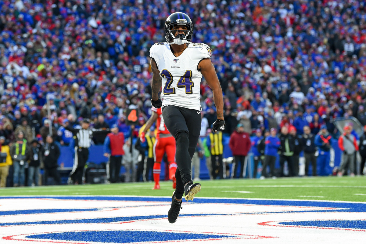 Baltimore Ravens cornerback Marcus Peters jumps