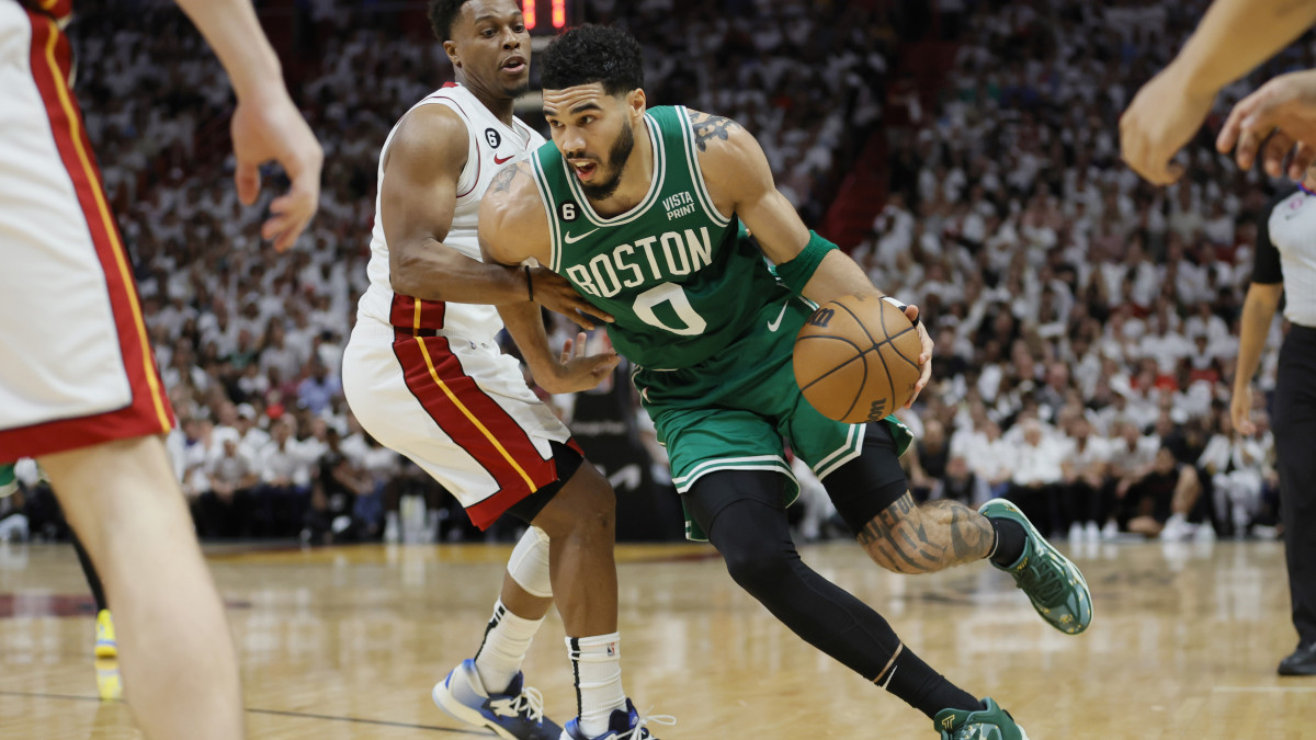 Boston Celtics forward Jayson Tatum shoots against Miami Heat guard Kyle Lowry in the third quarter during game four of the Eastern Conference Finals.