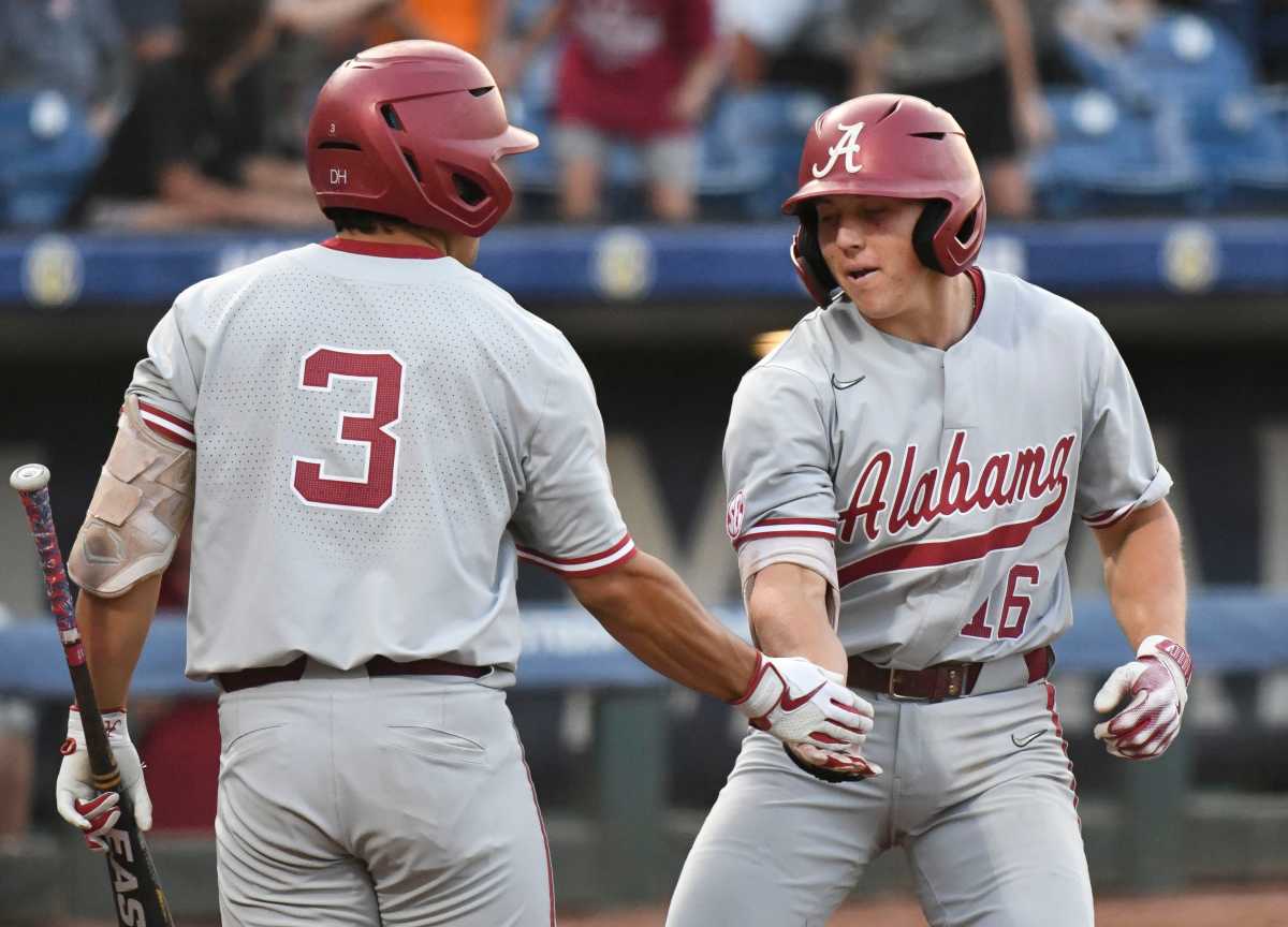 Alabama hitter Dominic Tamez (3) congratulates Alabama hitter Colby Shelton (16) after Shelton hit a solo homer against Florida during the second round of the SEC Baseball Tournament at the Hoover Met Wednesday, May 24, 2023.