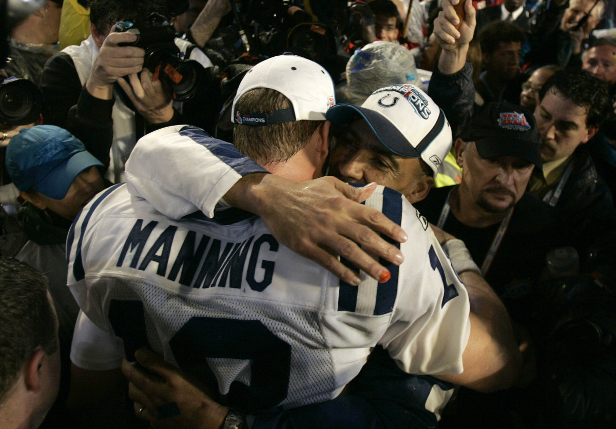 Feb 4, 2007; Miami, FL, USA; Indianapolis Colts quarterback Peyton Manning (18) celebrates with head coach Tony Dundy after the Indianapolis Colts defeated the Chicago Bears 29-17 in Super Bowl XLI at Dolphins Stadium.