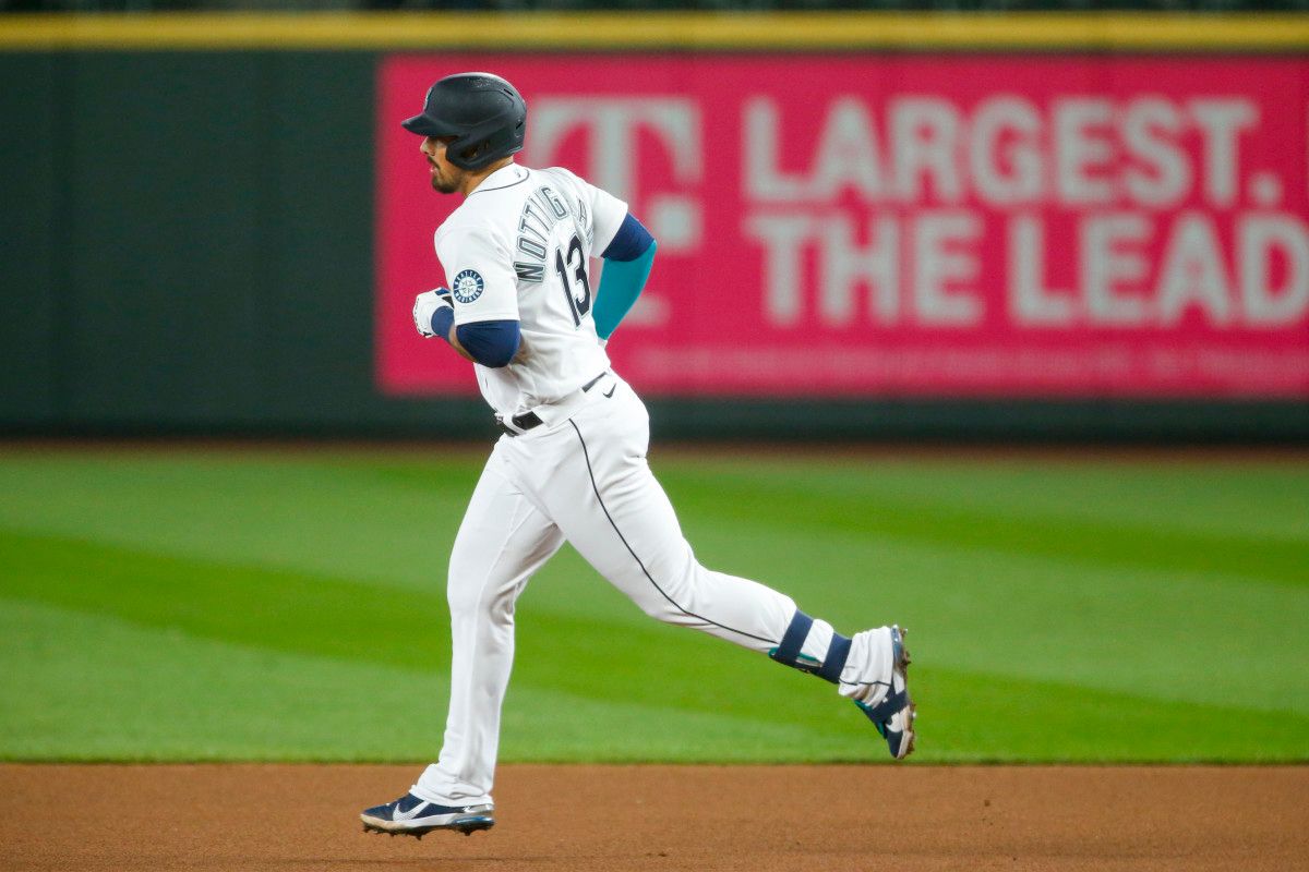 Seattle Mariners first baseman Jacob Nottingham runs the bases after hitting a solo-home run against the Texas Rangers. (2021)