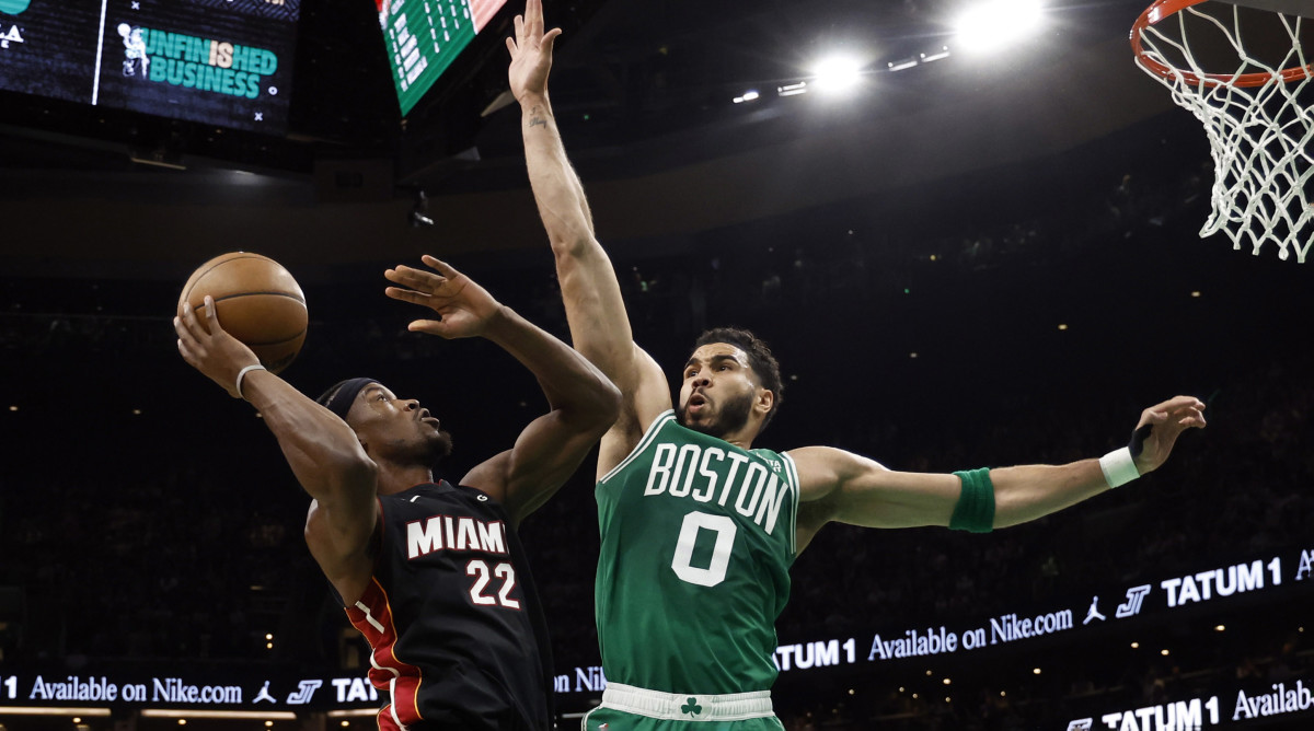 Boston Celtics’ Jayson Tatum guards Miami Heat’s Jimmy Butler in Game 5 of the Eastern Conference Finals.