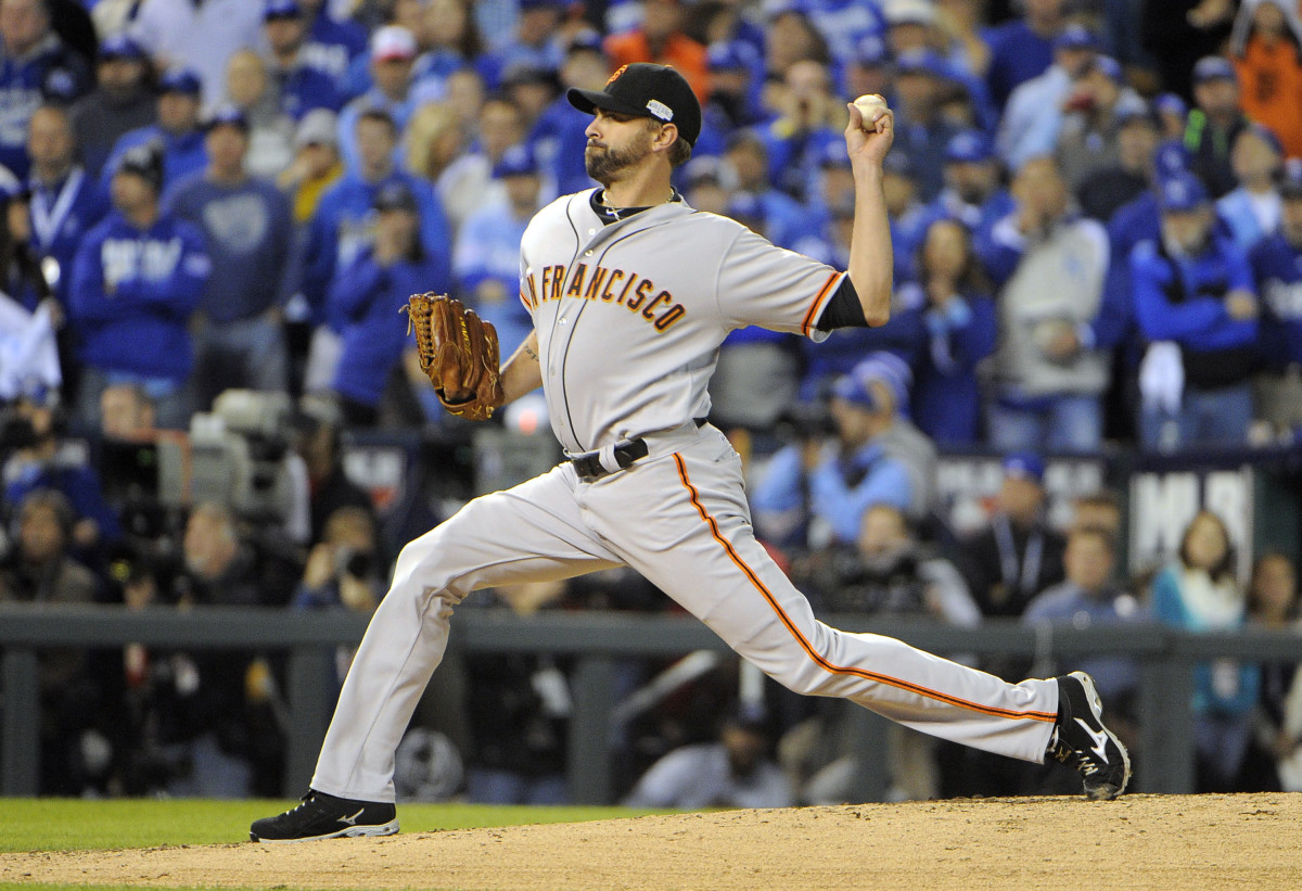 SF Giants relief pitcher Jeremy Affeldt throws a pitch against the Kansas City Royals in the second inning during game seven of the 2014 World Series.