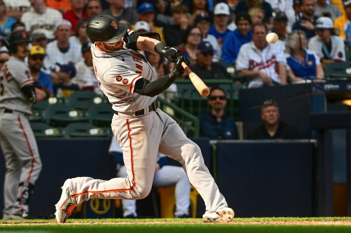 SF Giants left fielder Mitch Haniger hits a two run home run in the eighth inning against the Milwaukee Brewers on May 27, 2023.