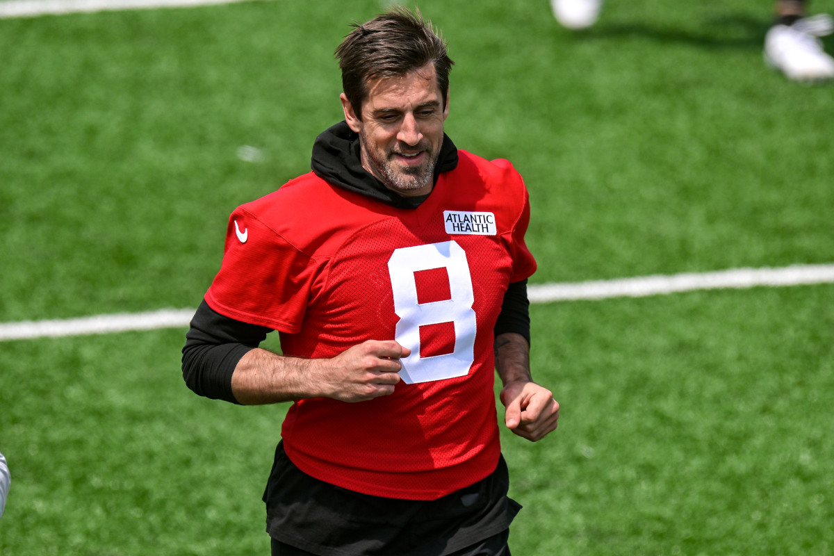 Jets' QB Aaron Rodgers jogs lightly at OTAs on May 23 in Florham Park