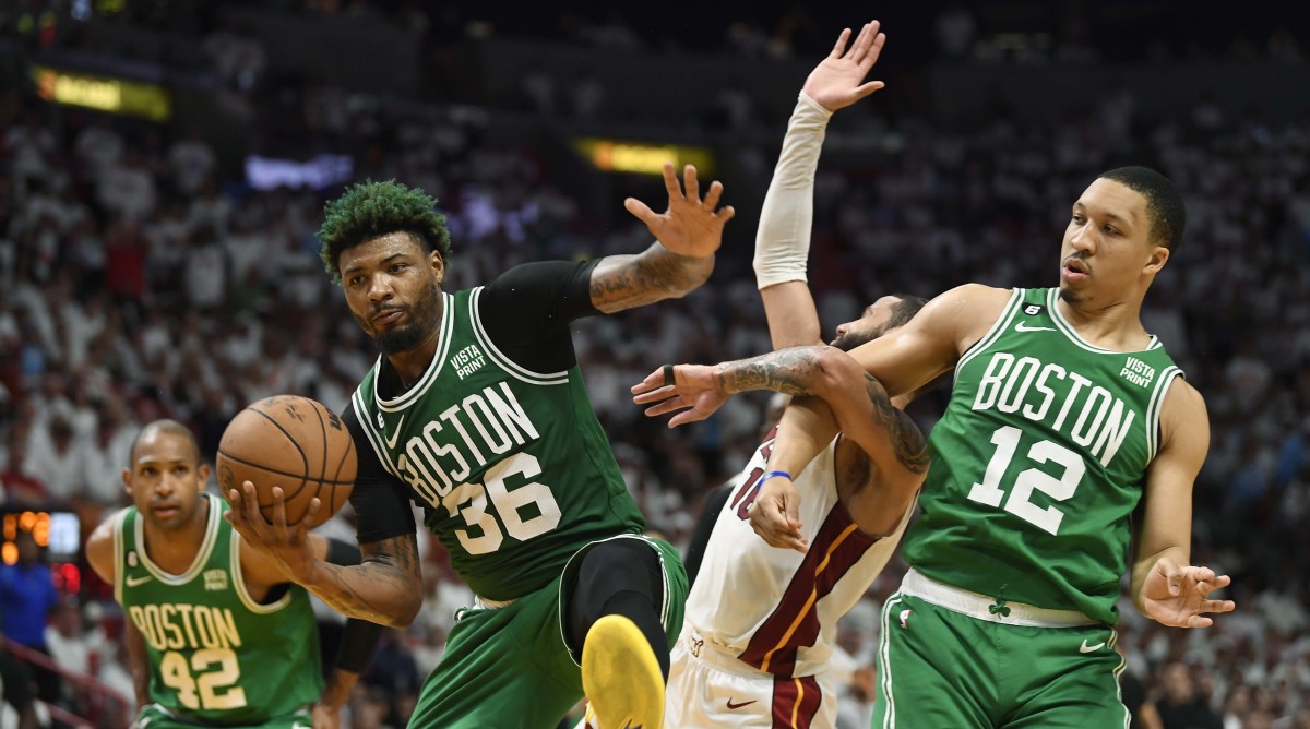 The Celtics fighting for a rebound