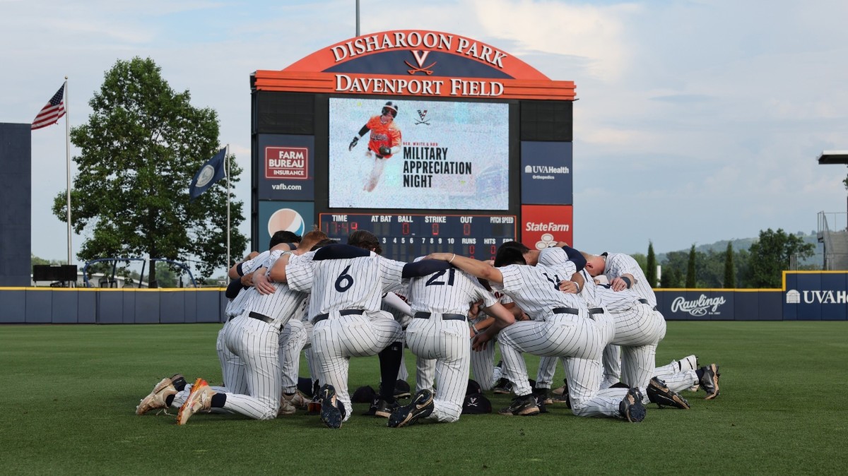 The Virginia baseball team huddles before a game against Louisville at Disharoon Park.