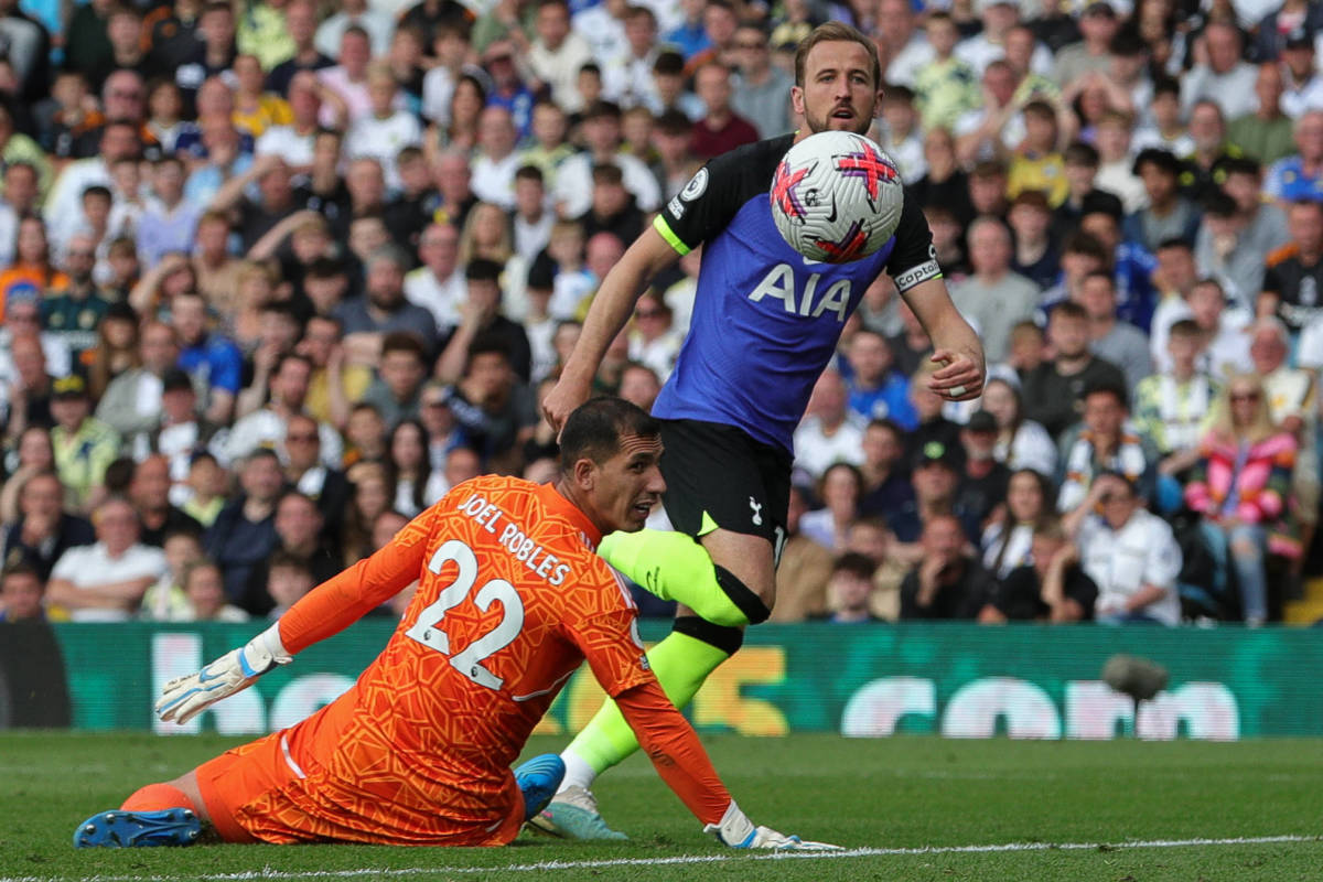 Tottenham striker Harry Kane pictured shooting past Leeds goalkeeper Joel Robles to score his 30th Premier League goal of the 2022/23 season