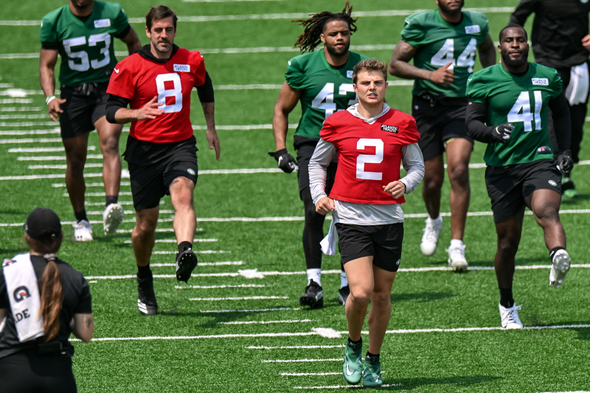 Zach Wilson (2) jogs at Jets' OTAs practice on May 23