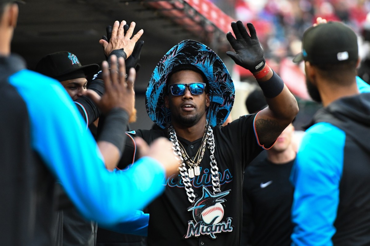 Miami Marlins designated hitter Jorge Soler (12) celebrates with teammates in the dugout after hitting a home run against the Los Angeles Angels during the third inning at Angel Stadium. (Jonathan Hui-USA TODAY Sports)