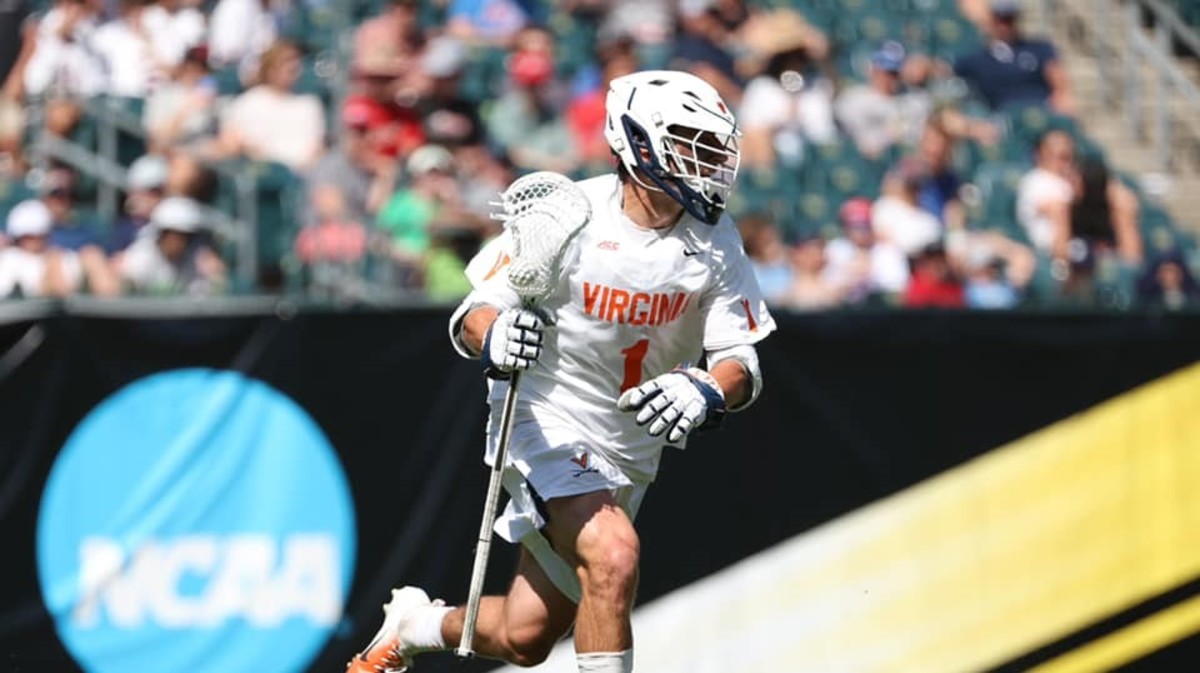 Connor Shellenberger dodges with the ball during the Virginia men's lacrosse game against Notre Dame in the semifinals of the NCAA Men's Lacrosse Championship at Lincoln Financial Field in Philadelphia, Pennsylvania.