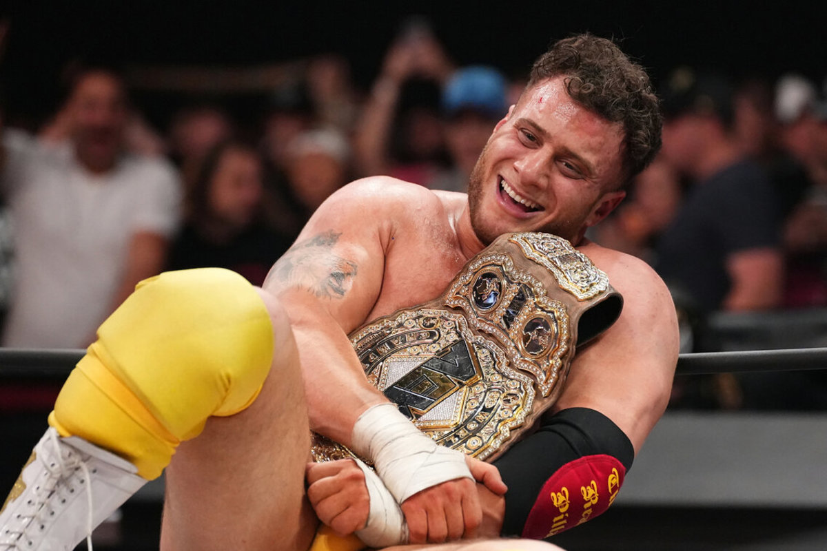 MJF smiles with the AEW championship