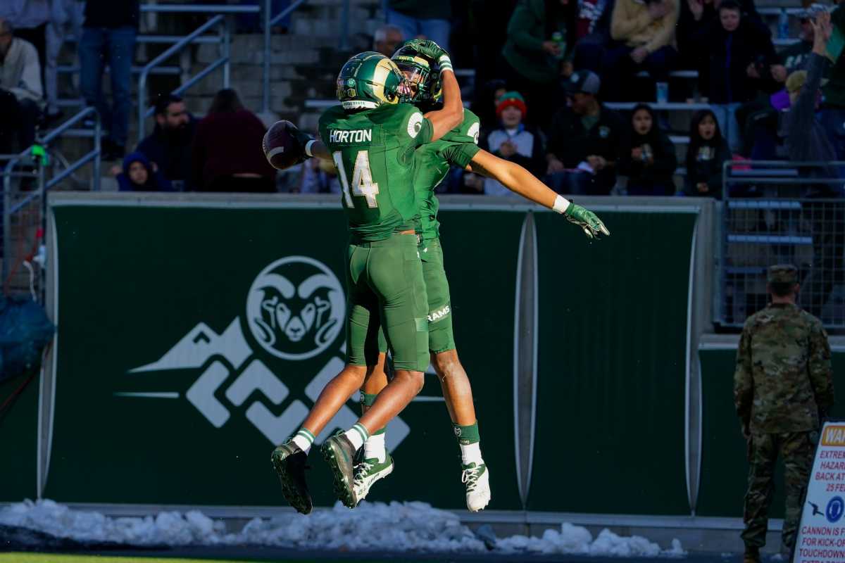 Nov 25, 2022; Fort Collins, Colorado, USA; Colorado State Rams wide receiver Justus Ross-Simmons (85) celebrates his touchdown with teammate Colorado State Rams wide receiver Tory Horton (14) at Sonny Lubick Field at Canvas Stadium. Ncaa Football New Mexico At Colorado State