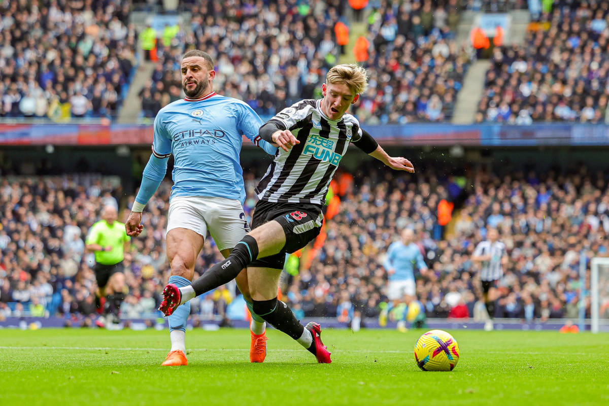 Manchester City right-back Kyle Walker (left) and Newcastle midfielder Anthony Gordon pictured in action during the 2022/23 Premier League season