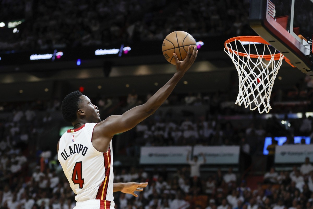 Miami Heat guard Victor Oladipo (4) drives to the basket in the fourth quarter against the Milwaukee Bucks during game three of the 2023 NBA Playoffs at Kaseya Center.